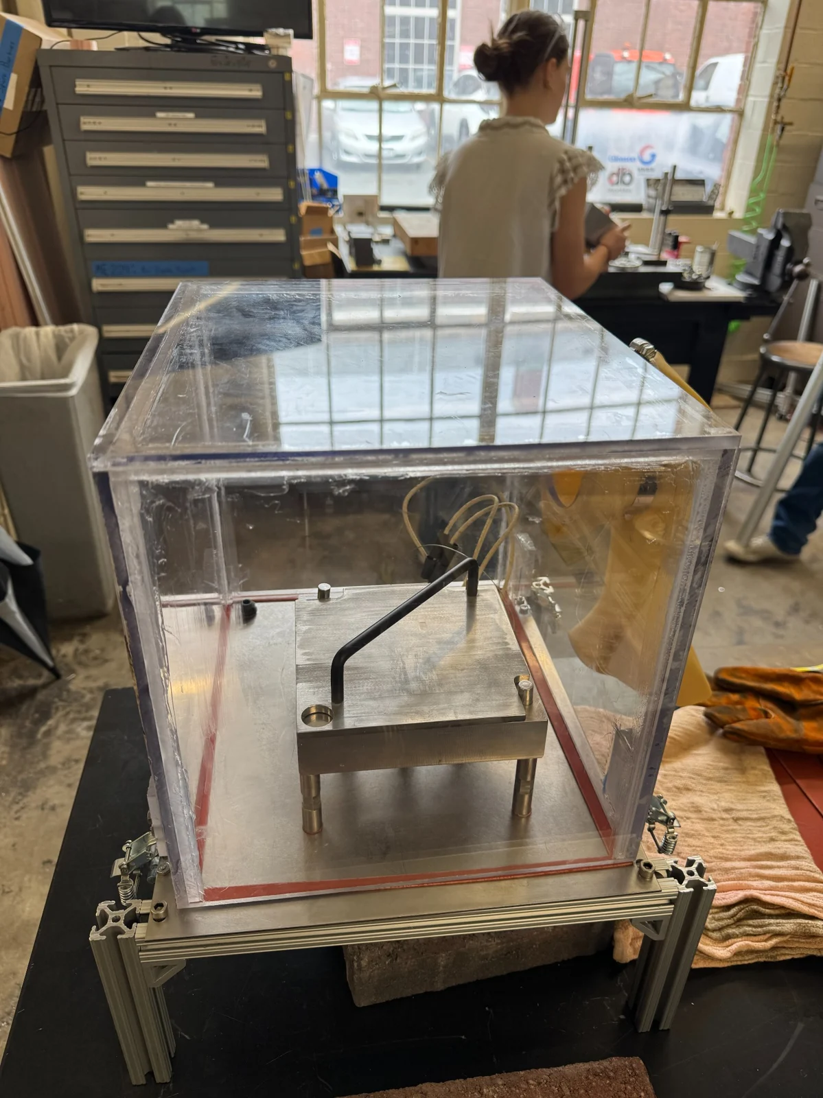 Fabricated glovebox and stainless-steel reactor assembly.