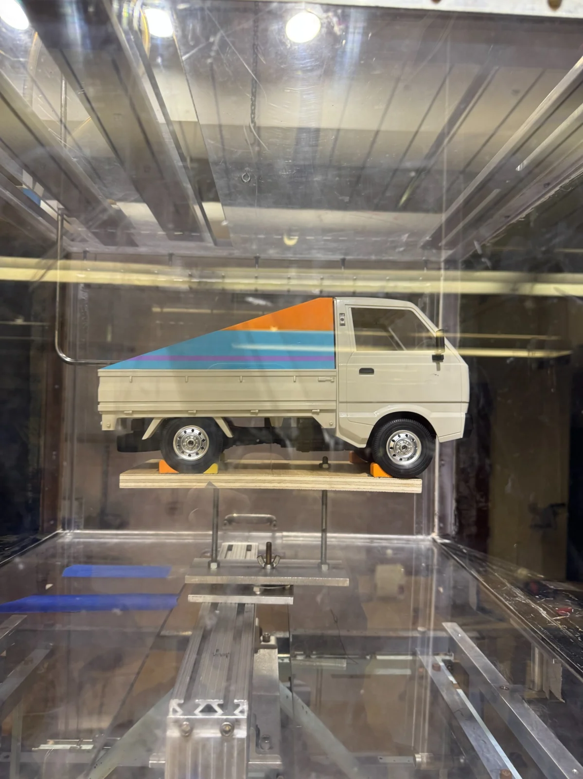 Sloped truck-bed cover in the wind tunnel.